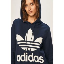Adidas Originals - Bluza. Niebieskie bluzy damskie adidas Originals, z nadrukiem, z bawełny, bez rękawów, z kapturem. W wyprzedaży za 199,90 zł.