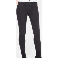 Jegginsy skinny basic - Czarny. Czarne jeansy damskie Mohito, bez wzorów, z jeansu. Za 79,99 zł.