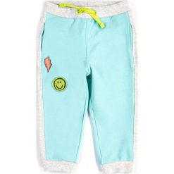 Joggery męskie: Coccodrillo – Spodnie dziecięce 56-86 cm