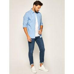 Jeansy Skinny Fit Armani Exchange 8NZJ14 Z884Z 1500. Niebieskie jeansy męskie Armani Exchange, m, bez wzorów. W wyprzedaży za 319,00 zł.