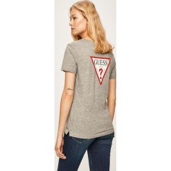 Guess Jeans - T-shirt. Białe bluzki damskie Guess Jeans, s, z aplikacjami, z bawełny, z okrągłym kołnierzem. W wyprzedaży za 159,90 zł.