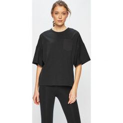 Reebok - Top. Czarne topy damskie Reebok, s, bez wzorów, z elastanu, z okrągłym kołnierzem. W wyprzedaży za 89,90 zł.