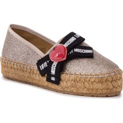 Espadryle LOVE MOSCHINO - JA10133G07JH0900 Platino. Żółte espadryle damskie Love Moschino, bez wzorów, z tworzywa sztucznego, bez obcasa, na koturnie. W wyprzedaży za 389,00 zł.