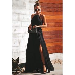 Sukienka GRETEL BLACK. Czarne sukienki damskie Sukienka GRETEL BLACK, s, bez wzorów, bez kołnierzyka, bez rękawów, długie. W wyprzedaży za 99,00 zł.