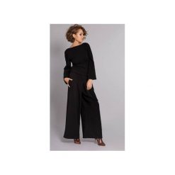 Kombinezon Classy Babe - czarny. Czarne kombinezony damskie marki Madnezz, s, w paski, z elastanu, eleganckie, bez kołnierzyka, bez rękawów. Za 399,00 zł.