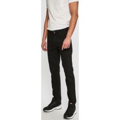 Dickies - Spodnie. Czarne spodnie męskie Dickies, na co dzień, bez wzorów, z bawełny, casualowe. W wyprzedaży za 129,90 zł.