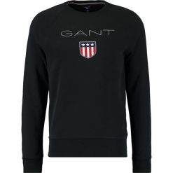 GANT SHIELD CNECK Bluza black. Czarne kardigany męskie GANT, m, z bawełny. W wyprzedaży za 341,10 zł.