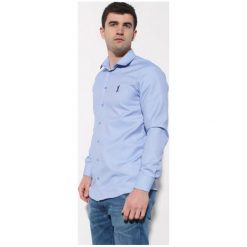 Koszula Edward Orlovski Knit Błękitna. Niebieskie koszule męskie Edward Orlovski, m, bez wzorów, z bawełny, eleganckie, bez kołnierzyka, z długim rękawem. Za 130,00 zł.