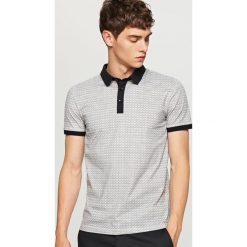 Wzorzysta koszulka polo - Szary. Szare koszulki męskie Reserved, s, bez wzorów, bez rękawów. W wyprzedaży za 49,99 zł.