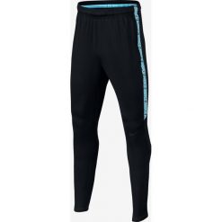 Chinosy chłopięce: Nike Spodnie dziecięce B Dry Squad Pant czarno-niebieskie r. L (147-158cm) (859297 016)