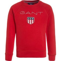 GANT SHIELD LOGO C NECK Bluza bright red. Czerwone bluzy dziewczęce GANT, z bawełny. Za 299,00 zł.