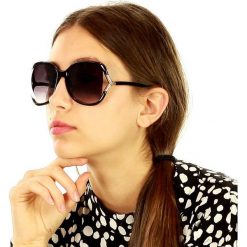 Oversizowe okulary przeciwsłoneczne mazzini butterfly look czarny. Czarne okulary przeciwsłoneczne damskie LOOKS STYLE EYEWAER, eleganckie, motyl. W wyprzedaży za 59,90 zł.