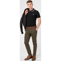 Calvin Klein Essentials Polo Koszulka Czarny. Czarne podkoszulki męskie Calvin Klein, xl, bez wzorów, z elastanu, bez rękawów. Za 290,95 zł.