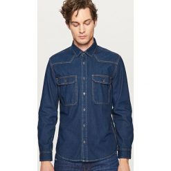 Jeansowa koszula regular fit - Granatowy. Niebieskie koszule męskie Reserved, s, bez wzorów, z jeansu, bez kołnierzyka, bez rękawów. Za 119,99 zł.