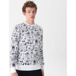 Bluza z komiksowym nadrukiem - Biały. Białe bluzy męskie marki House, s, z nadrukiem, bez kołnierzyka, bez rękawów, bez kaptura. Za 89,99 zł.