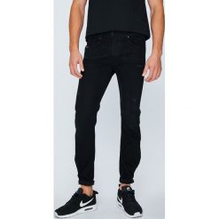 Diesel - Jeansy Belther. Szare jeansy męskie regular Diesel. Za 749,90 zł.