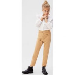 Mango Kids - Spodnie dziecięce Aviv 110-164 cm. Pomarańczowe spodnie dziewczęce Mango Kids, bez wzorów, z bawełny. Za 89,90 zł.
