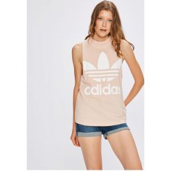Adidas Originals - Top. Różowe topy damskie marki adidas Originals, z nadrukiem, z elastanu, z okrągłym kołnierzem. W wyprzedaży za 99,90 zł.