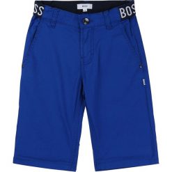 Boss - Szorty dziecięce 164-176 cm. Niebieskie spodenki chłopięce Boss, bez wzorów, z elastanu, casualowe. Za 349,90 zł.
