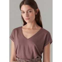 Koszulka oversize z lyocellem - Fioletowy. Fioletowe koszulki damskie Mohito, s, bez wzorów, z lyocellu, bez kołnierzyka, bez rękawów. Za 49,99 zł.