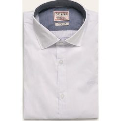 Guess Jeans - Koszula. Czarne koszule męskie Guess Jeans, s, z aplikacjami, z elastanu, eleganckie, z klasycznym kołnierzykiem, z długim rękawem. Za 279,90 zł.