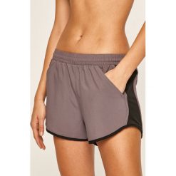 Under Armour - Szorty sportowe. Spodenki sportowe damskie Under Armour, s, bez wzorów, z poliesteru, sportowe. W wyprzedaży za 79,90 zł.