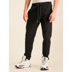 Spodnie dresowe Just Cavalli S03KA0198. Czarne jeansy męskie Just Cavalli, s, bez wzorów, z bawełny. W wyprzedaży za 439,00 zł.