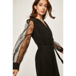 Answear - Sukienka. Czarne sukienki damskie ANSWEAR, s, bez wzorów, z elastanu, bez kołnierzyka, z długim rękawem, długie, mini, dopasowane. W wyprzedaży za 79,90 zł.