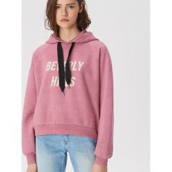 Bluza typu hoodie - Różowy. Różowe bluzy damskie Sinsay, s, bez wzorów, bez rękawów, bez kaptura. W wyprzedaży za 29,99 zł.