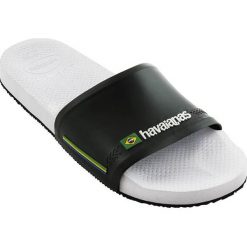 Havaianas - Klapki. Białe klapki damskie Havaianas, bez wzorów, z gumy, bez obcasa, na obcasie. W wyprzedaży za 69,90 zł.