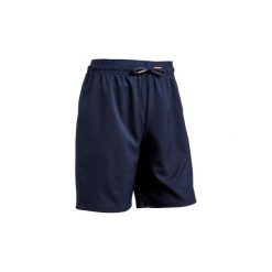 Spodenki do piłki nożnej F500 dla dzieci. Czerwone spodenki dziewczęce KIPSTA, bez wzorów, z elastanu, młodzieżowe. Za 34,99 zł.