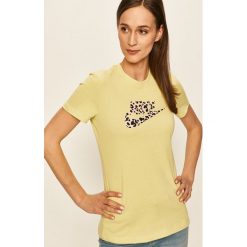 Nike Sportswear - T-shirt. Żółte topy damskie Nike Sportswear, s, z nadrukiem, z bawełny, casualowe, z okrągłym kołnierzem. W wyprzedaży za 129,90 zł.