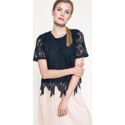 Vero Moda - Top. Niebieskie topy damskie marki Vero Moda, s, z poliesteru, z okrągłym kołnierzem. W wyprzedaży za 69,90 zł.