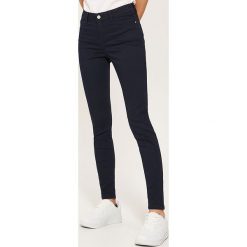 Spodnie skinny - Granatowy. Niebieskie rurki damskie House, s, bez wzorów. W wyprzedaży za 49,99 zł.
