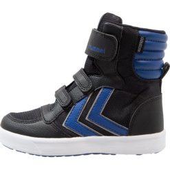 Hummel Tenisówki i Trampki wysokie limoges blue. Niebieskie trampki dziewczęce Hummel, z tworzywa sztucznego. W wyprzedaży za 220,35 zł.