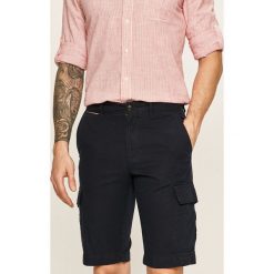 Tommy Hilfiger - Szorty. Niebieskie spodenki i szorty męskie TOMMY HILFIGER, bez wzorów, z bawełny, casualowe. W wyprzedaży za 249,90 zł.
