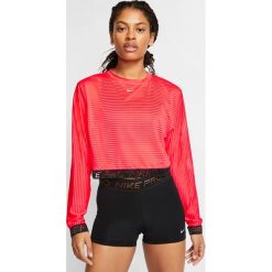 Nike Nike Pro Koszulka Czerwony. Czerwone koszulki damskie Nike, l, bez wzorów, z elastanu, bez kołnierzyka. Za 171,95 zł.