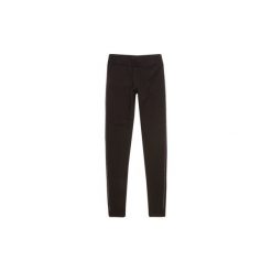 Spodnie damskie legginsy. Czarne legginsy marki TXM. Za 19,99 zł.