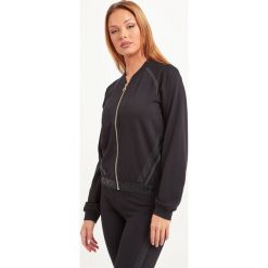 BLUZA LIU JO SPORT. Żółte bluzy sportowe damskie Liu Jo Sport, s, bez wzorów, bez rękawów, bez kaptura. Za 549,00 zł.