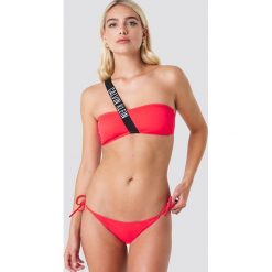 Calvin Klein Dół bikini Cheeky String Side Tie N - Red. Czerwone bikini Calvin Klein. Za 161,95 zł.