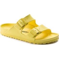 Birkenstock Klapki damskie Arizona Vibrant Yellow. Żółte klapki damskie Birkenstock, bez wzorów, bez obcasa. Za 88,50 zł.