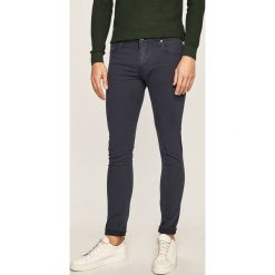 Guess Jeans - Spodnie. Czarne jeansy męskie Guess Jeans, m, z aplikacjami. Za 369,90 zł.