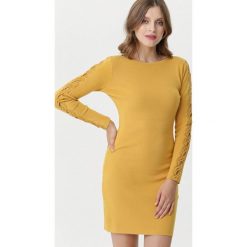 Żółta Sukienka Maianbar. Żółte sukienki damskie Born2be, xl, z aplikacjami, z dzianiny, eleganckie, z okrągłym kołnierzem, bez rękawów, długie, mini. Za 109,99 zł.