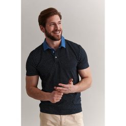 Koszulka polo w kolorze granatowym. Niebieskie koszulki męskie TATUUM, s, bez wzorów, z bawełny, polo, bez rękawów. W wyprzedaży za 54,95 zł.