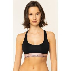 Biustonosz top Calvin Klein Underwear 000QF5579E. Czarne topy damskie Calvin Klein Underwear, xs, bez wzorów, bez kołnierzyka. W wyprzedaży za 99,00 zł.
