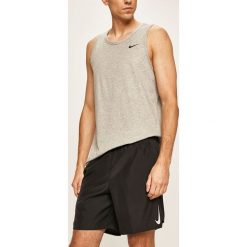 Nike - Szorty. Czerwone spodenki sportowe męskie Nike, s, z poliesteru, sportowe. Za 129,90 zł.