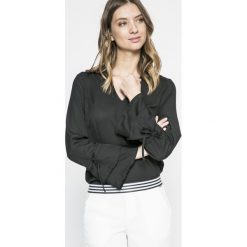 Vero Moda - Bluzka. Czarne bluzki damskie Vero Moda, na co dzień, s, bez wzorów, z poliesteru, casualowe, bez kołnierzyka, bez rękawów. W wyprzedaży za 39,90 zł.