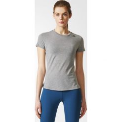 KOSZULKA - KR.REKAW CHSOGR PRIME TEE. Szare bluzki damskie marki Adidas, z elastanu, z krótkim rękawem. Za 49,99 zł.