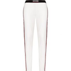 Spodnie dresowe MOSCHINO UNDERWEAR. Białe spodnie damskie Moschino Underwear, z bawełny. W wyprzedaży za 409,00 zł.