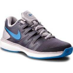 Buty NIKE - Air Zoom Prestige Hc AA8020 040 Gridiron/Photo Blue. Niebieskie buty sportowe męskie Nike, ze skóry ekologicznej, bez zapięcia, tenisowe. W wyprzedaży za 299,00 zł.